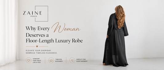 South African woman wearing a floor-length champagne satin robe Luxury satin robe in a safari-inspired bedroom Elegant floor-length robe with elasticated sleeves Woman enjoying coffee in a luxury robe Proudly South African luxury robe by Zaine